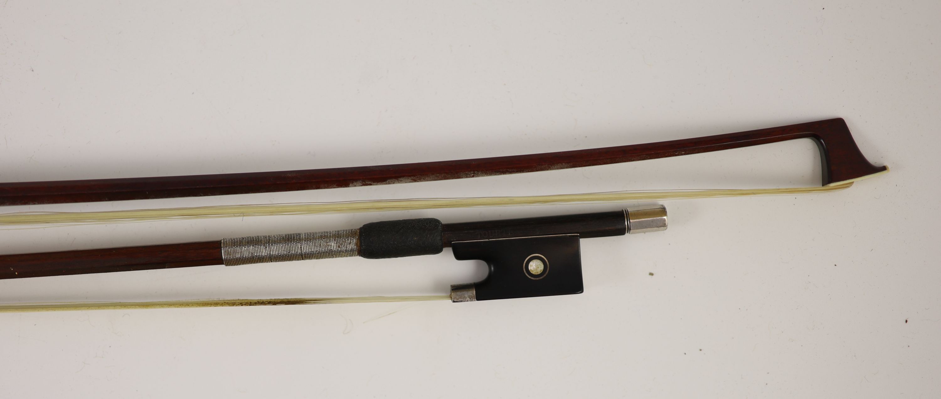 Two stamped violin bows, Both 74.5 cm long